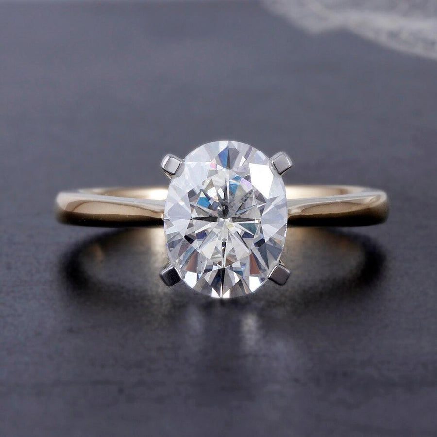 Oval Solitaire Two-Tone Ring (1.5 Carat) - Moissanite, Done Better.