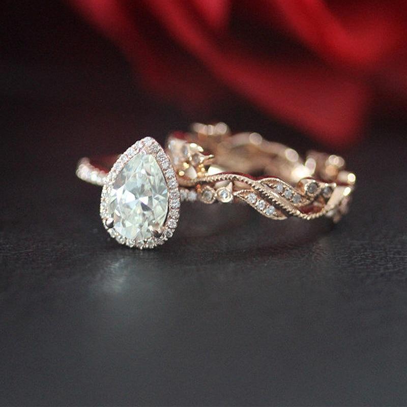 Pear Halo 1.5CT Ring & Eternity Band in 10/14K Gold - Moissanite, Done Better.